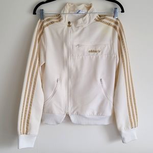 Adidas cream and gold size 34 (xs-s) jacket with 3 zipper pockets